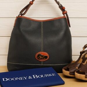 Dooney & Bourke Black Pebbled Leather Hobo Bag with Tortoise Duck Logo